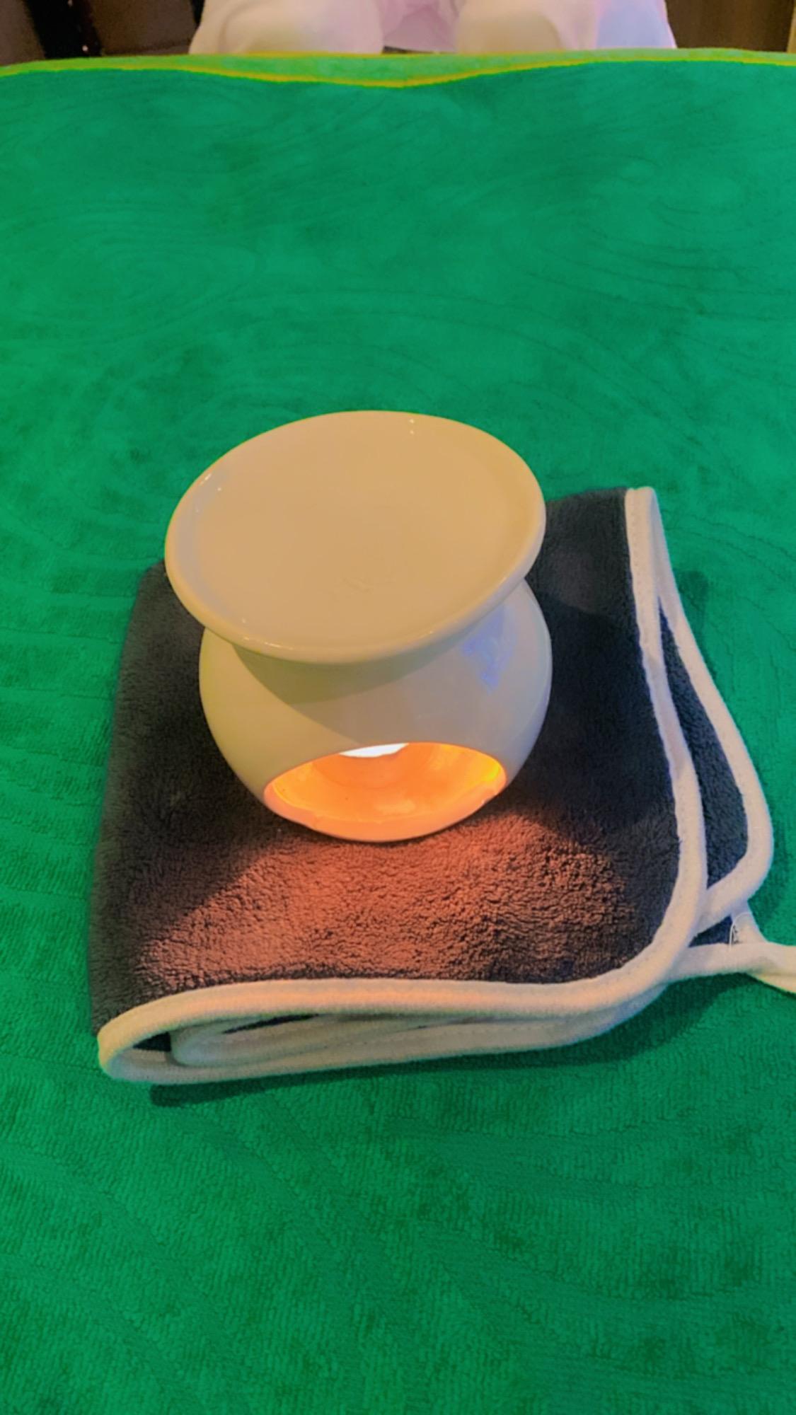Aromatherapy massage oils and burner for a calming treatment
