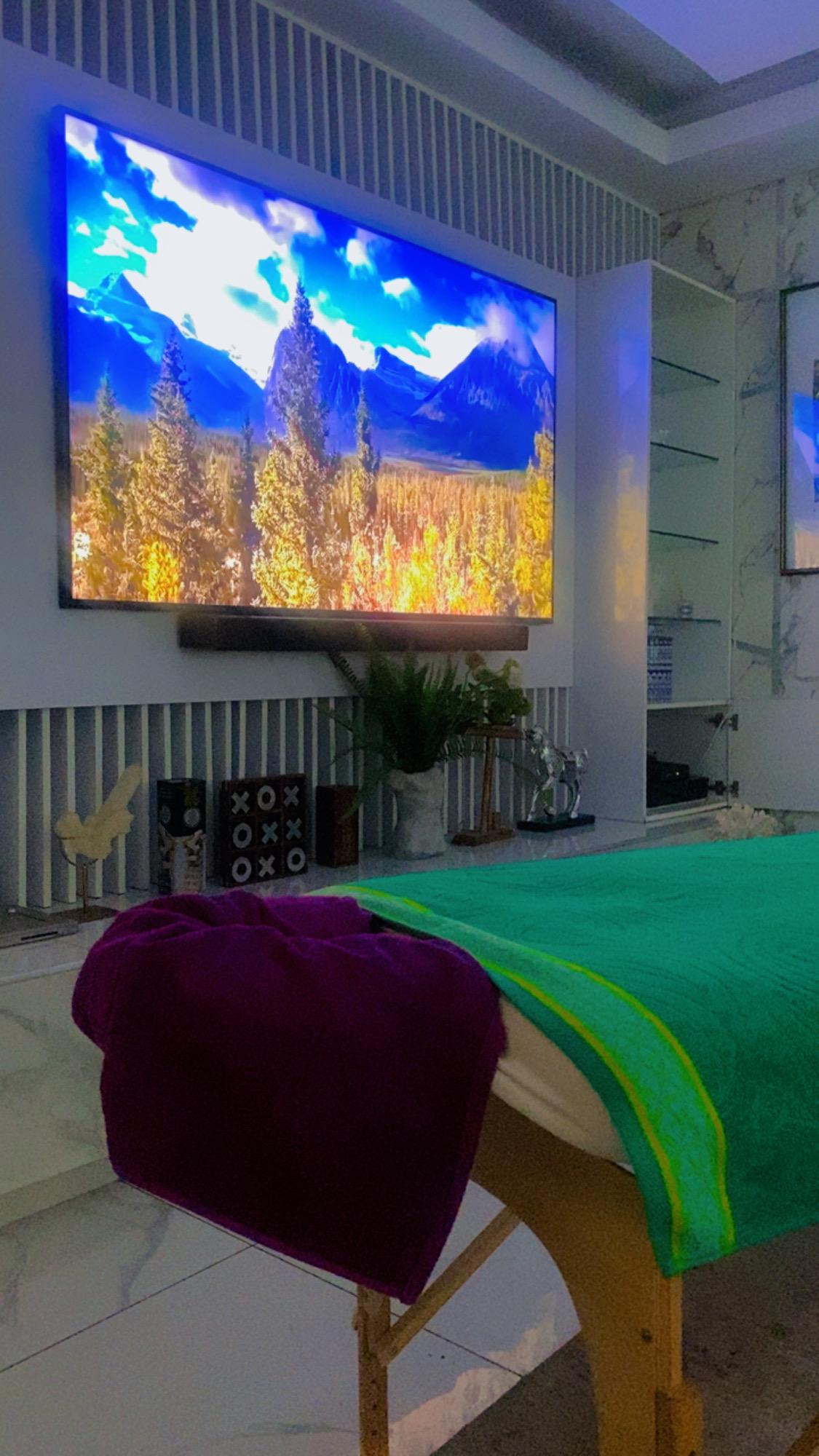 Pregnancy massage treatment space prepared for comfort and support